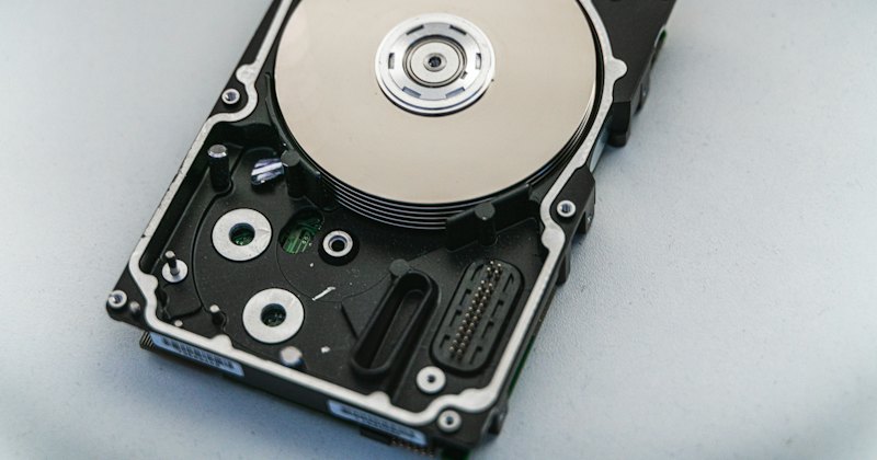 A hard disk drive with its cover removed